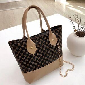 Elegant Tan and Black Tote Bag great for traveling very durable fu leather